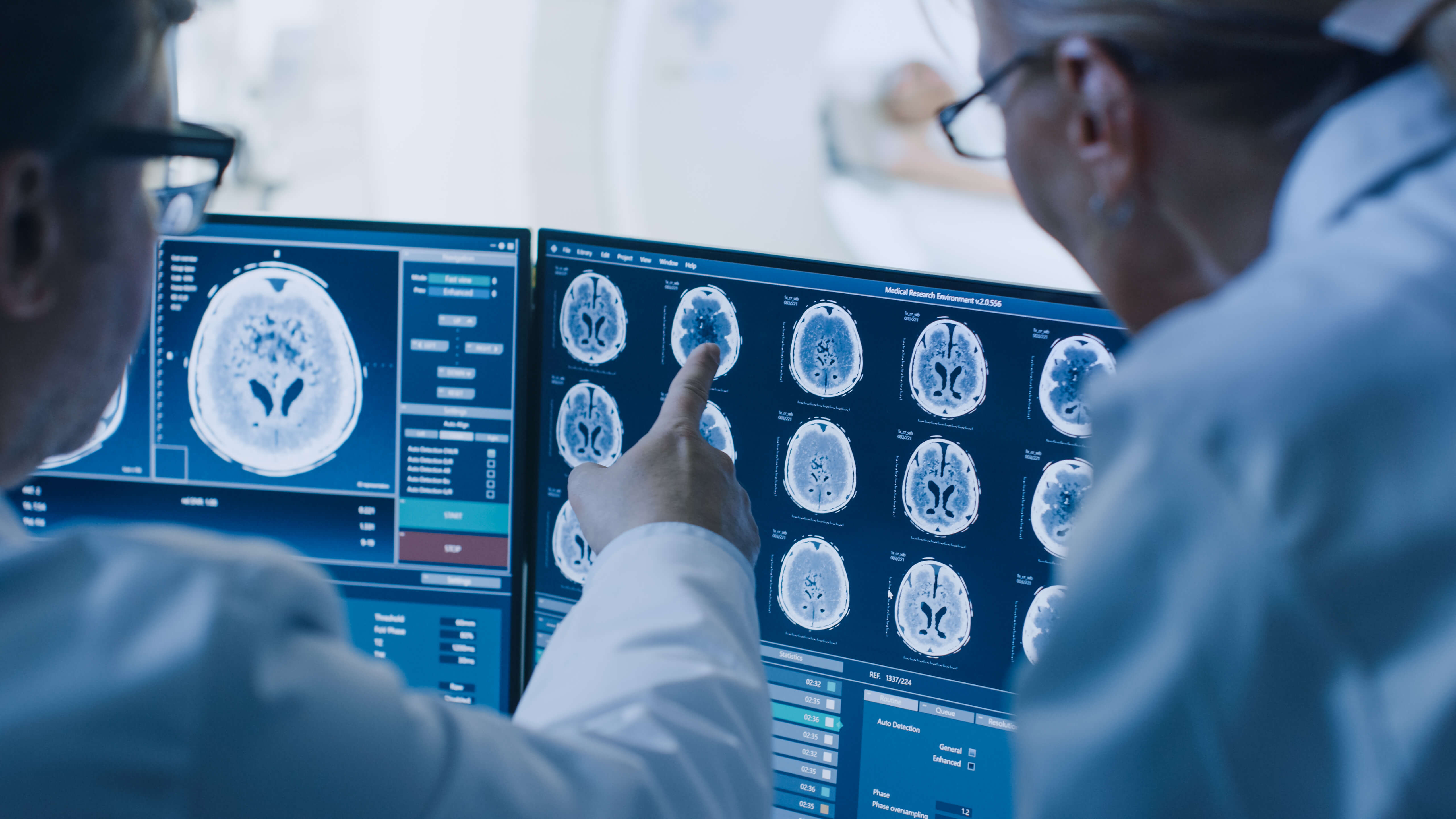 Healthcare professionals using imaging analytics software, or software as a medical device (SaMD), to analyze CT scan data.